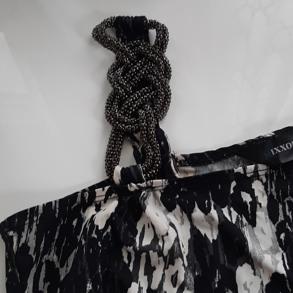 Assymetric dress with chain detail